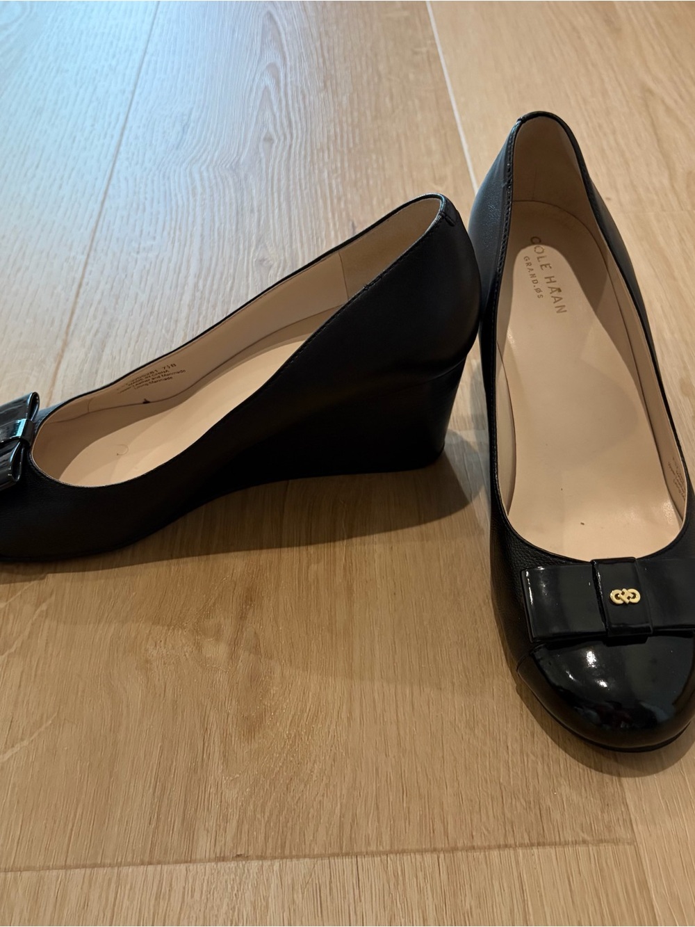 Cole Haan Black Leather Wedge Pumps with Patent Toe Bow